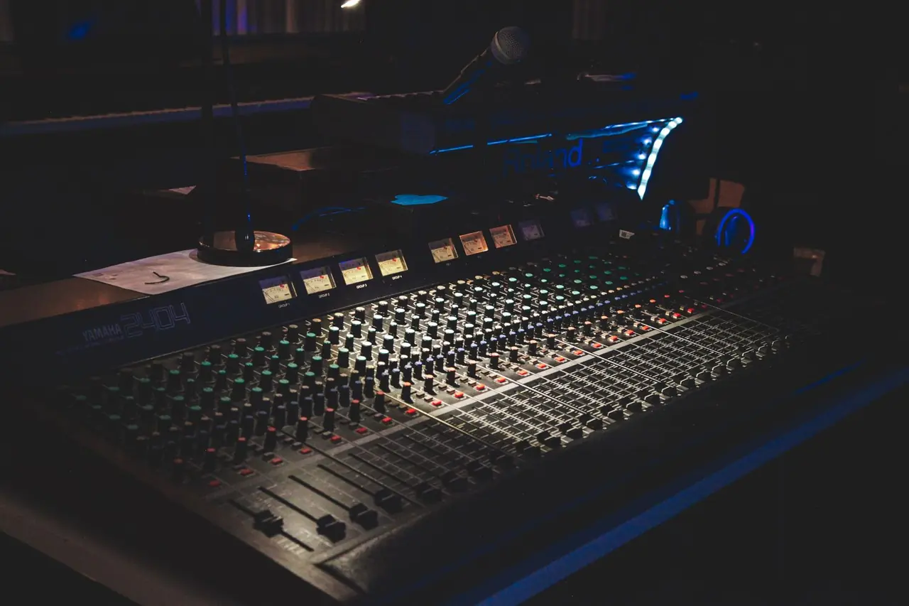 Precision analog mastering controls, dials, and metering interface