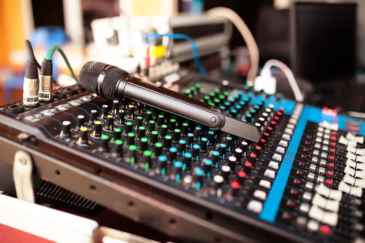 High-grade condenser vocal microphone set up in isolated vocal booth