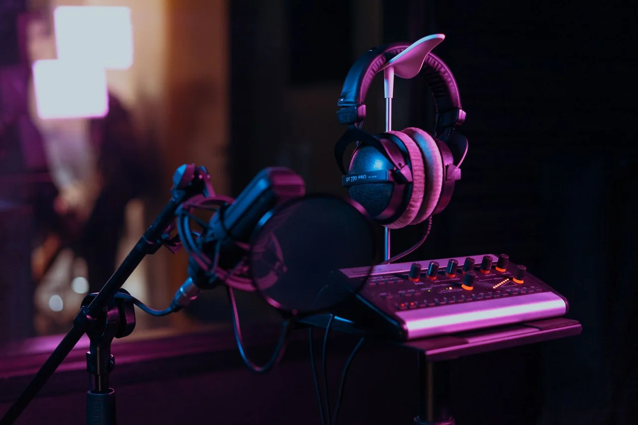 Professional studio microphone and isolation setup in recording room